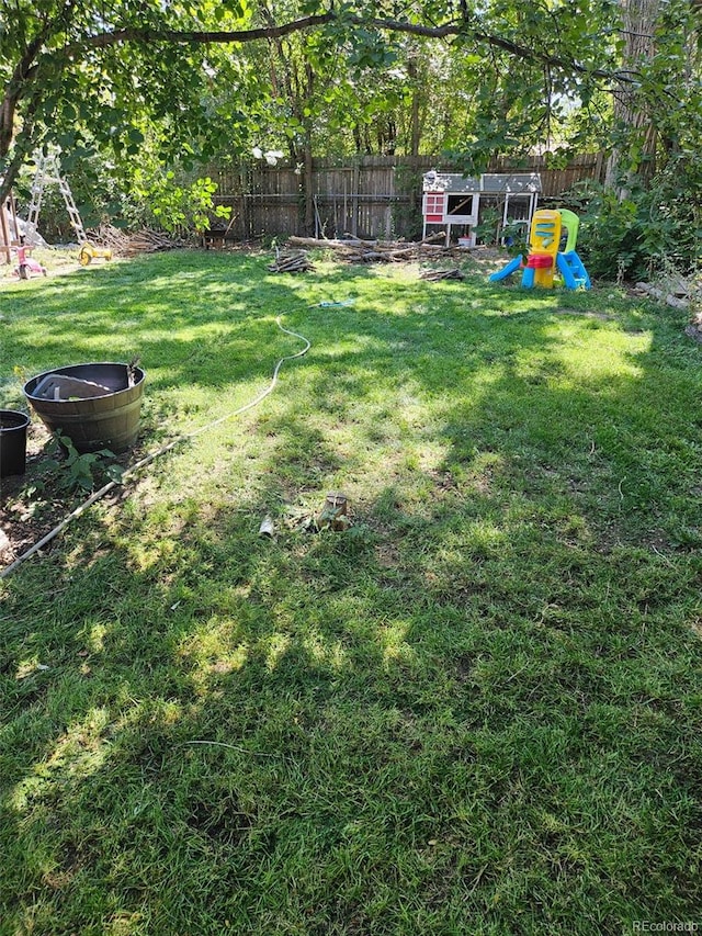 view of yard with a playground