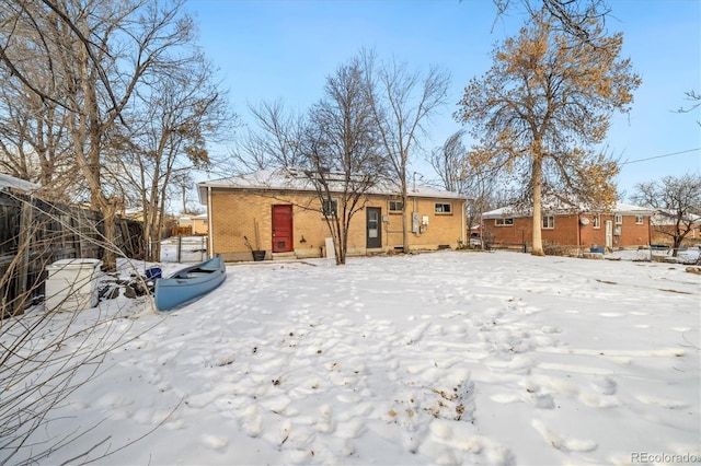 view of snow covered property