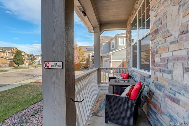 balcony featuring covered porch