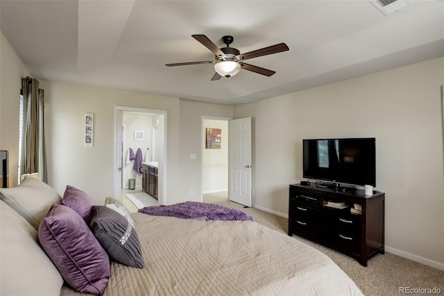 carpeted bedroom featuring connected bathroom and ceiling fan