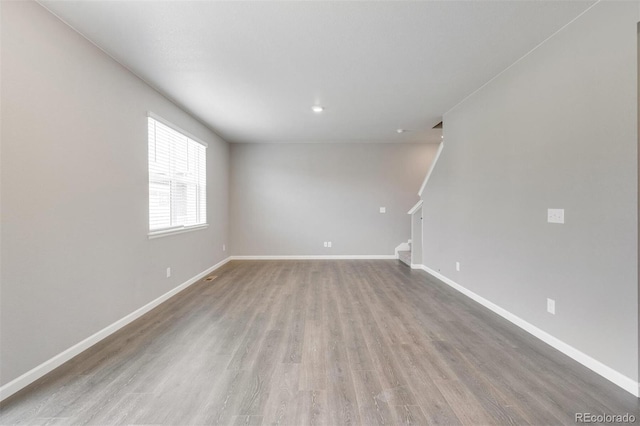 unfurnished room featuring light hardwood / wood-style flooring