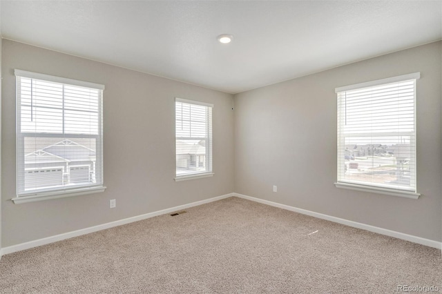 view of carpeted spare room