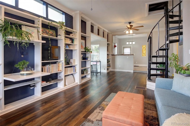 114 N 7th St, Colorado Springs, CO 80905 - living room with ornamental molding, stairs, wood finished floors, baseboards, and ceiling fan
