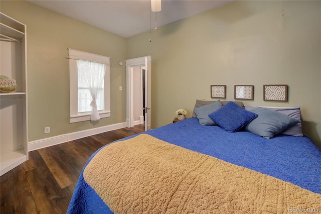 114 N 7th St, Colorado Springs, CO 80905 - bedroom featuring baseboards and wood finished floors
