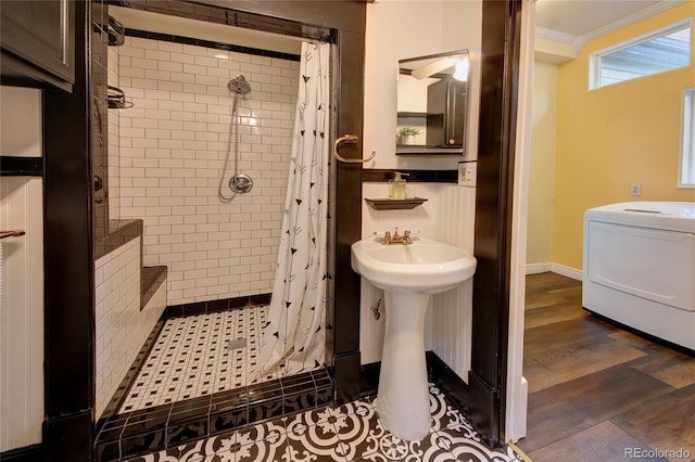 114 N 7th St, Colorado Springs, CO 80905 - full bath with a sink, washer / dryer, a shower stall, and ornamental molding