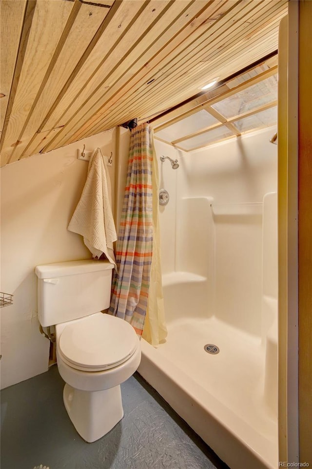 114 N 7th St, Colorado Springs, CO 80905 - full bath with a shower with curtain, concrete flooring, and toilet