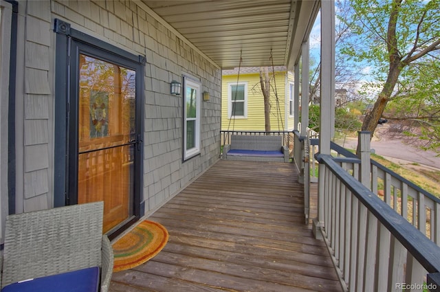 114 N 7th St, Colorado Springs, CO 80905 - deck featuring covered porch