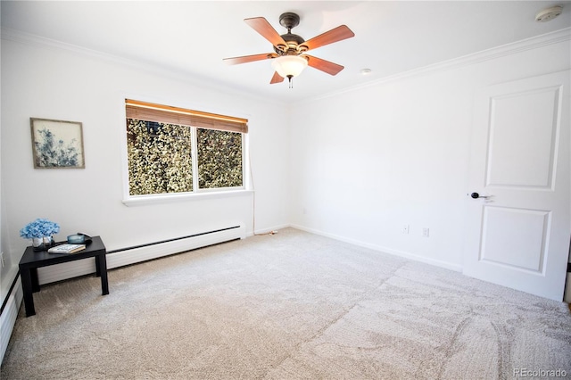 carpeted spare room with crown molding and ceiling fan