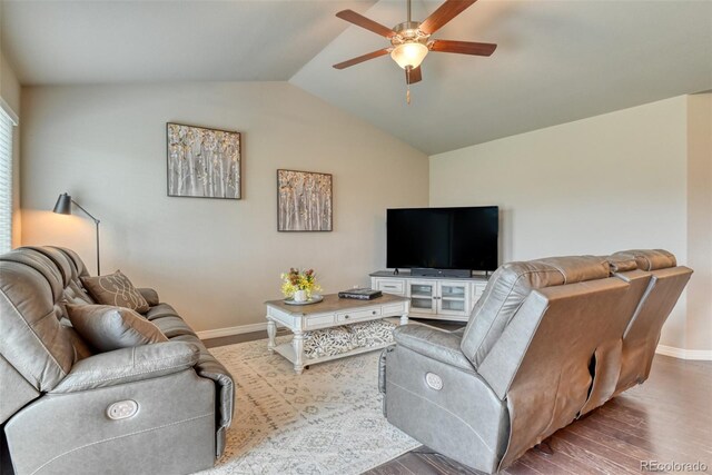 12718 Windingwalk Dr, Peyton, CO 80831 - living area featuring ceiling fan, lofted ceiling, baseboards, and wood finished floors