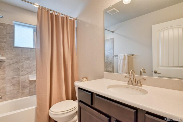 12718 Windingwalk Dr, Peyton, CO 80831 - bathroom featuring shower / bath combination with curtain, vanity, and toilet