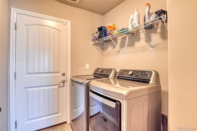 12718 Windingwalk Dr, Peyton, CO 80831 - laundry area with washing machine and clothes dryer