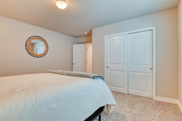 12718 Windingwalk Dr, Peyton, CO 80831 - bedroom with light carpet, a closet, and baseboards