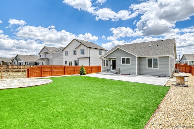 12718 Windingwalk Dr, Peyton, CO 80831 - rear view of property featuring a patio and a residential view