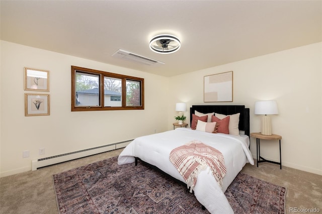 bedroom featuring carpet and baseboard heating