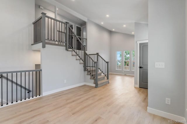 4740 W 108th Pl, Westminster, CO 80031 - stairway with wood finished floors, recessed lighting, and a high ceiling