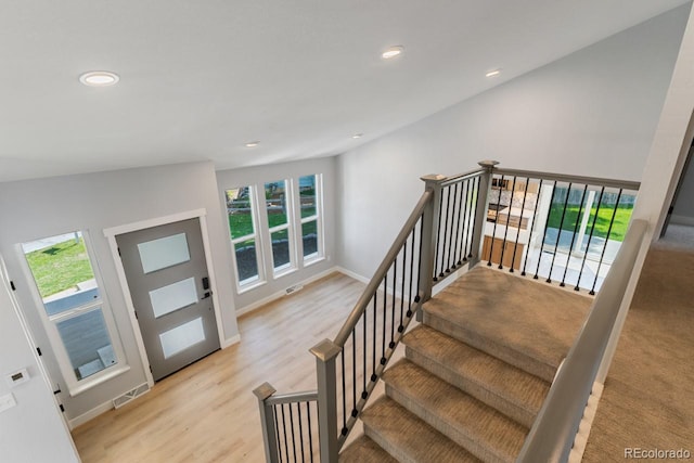 4740 W 108th Pl, Westminster, CO 80031 - stairway featuring recessed lighting and wood finished floors