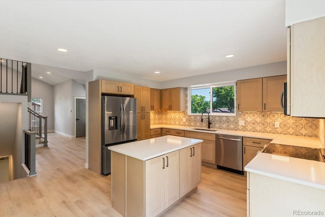 4740 W 108th Pl, Westminster, CO 80031 - kitchen featuring stainless steel appliances, light wood-style flooring, decorative backsplash, light countertops, and recessed lighting