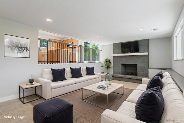 4740 W 108th Pl, Westminster, CO 80031 - living area with recessed lighting, a large fireplace, and light carpet