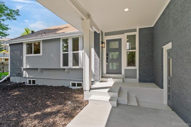 4740 W 108th Pl, Westminster, CO 80031 - doorway to property with brick siding and covered porch