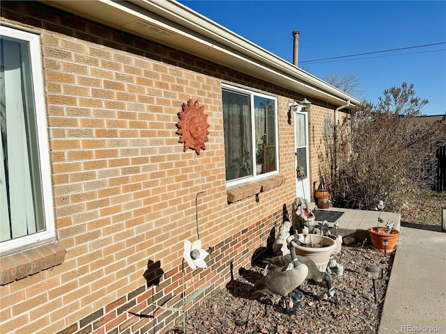 view of home's exterior with a patio area