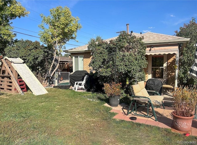 view of yard with a patio area