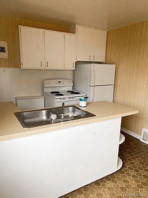 kitchen featuring white appliances