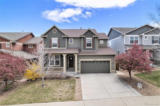 craftsman house with covered porch, driveway, roof with shingles, a garage, and a front lawn