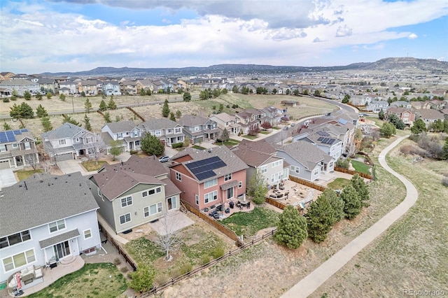 drone / aerial view featuring a mountain view and a residential view
