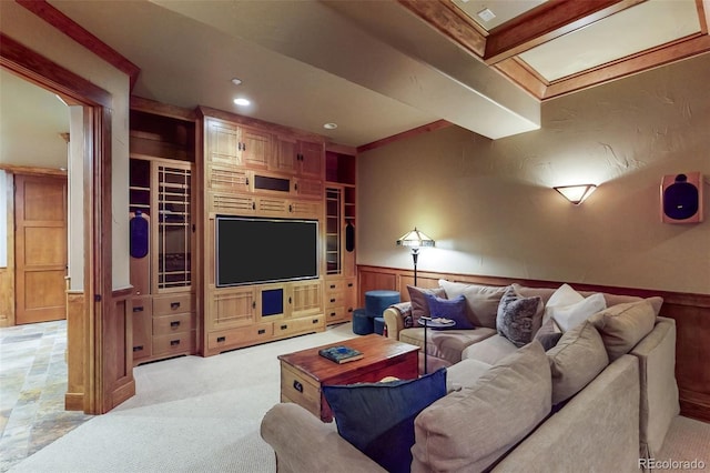 carpeted living room with built in shelves, wooden walls, and beam ceiling