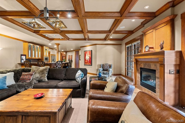 living room with coffered ceiling, beam ceiling, a fireplace, and light colored carpet