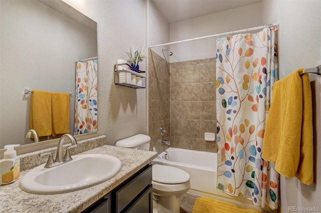 full bathroom featuring vanity, toilet, and shower / bath combo with shower curtain