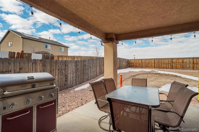 view of patio / terrace featuring a grill