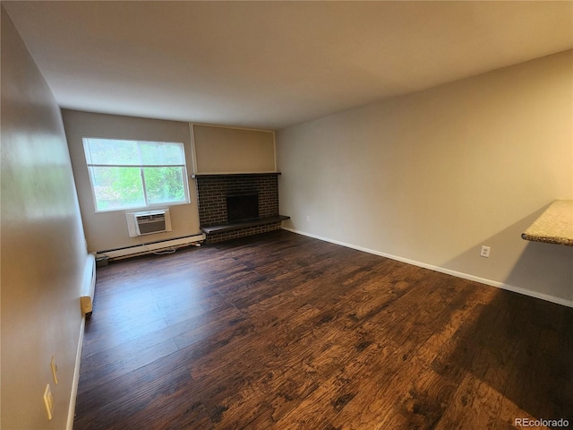 8330 Zuni St Unit 117, Denver, CO 80221 - unfurnished living room with dark wood finished floors, a fireplace, and baseboards