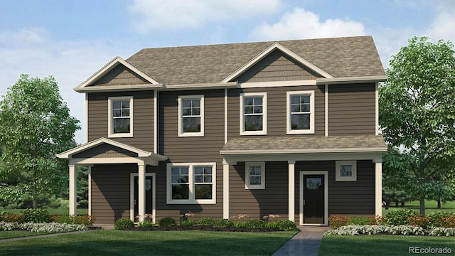 view of front of home with a shingled roof and a front lawn