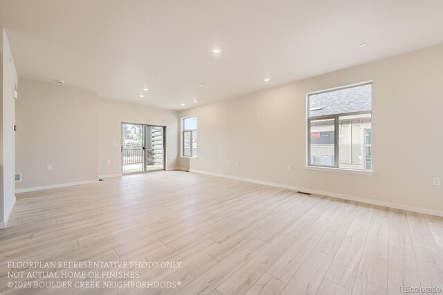 834 W 128th Pl, Westminster, CO 80234 - unfurnished room featuring visible vents, baseboards, recessed lighting, and light wood-style floors