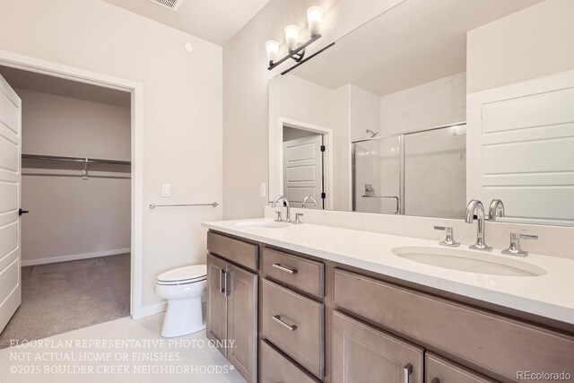 834 W 128th Pl, Westminster, CO 80234 - bathroom featuring toilet, a sink, double vanity, and a stall shower