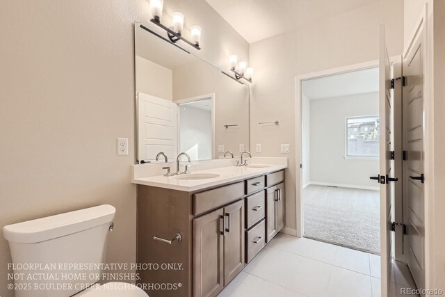 834 W 128th Pl, Westminster, CO 80234 - bathroom featuring tile patterned flooring, double vanity, toilet, and a sink