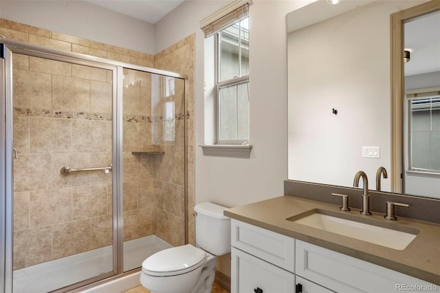 15252 W Warren Dr, Lakewood, CO 80228 - full bathroom with vanity, toilet, and a shower stall