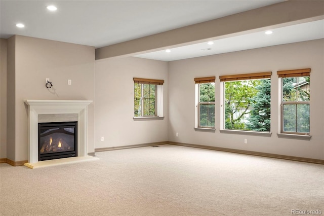 15252 W Warren Dr, Lakewood, CO 80228 - unfurnished living room with carpet floors, recessed lighting, baseboards, and a glass covered fireplace
