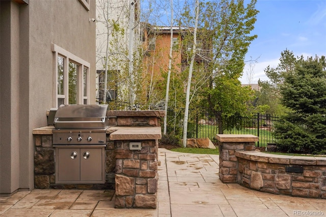 15252 W Warren Dr, Lakewood, CO 80228 - view of patio with fence and area for grilling