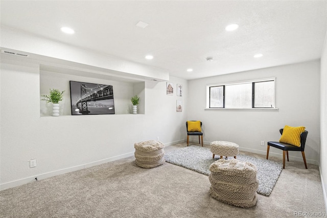 206 Troy St, Aurora, CO 80011 - living area featuring carpet flooring and recessed lighting