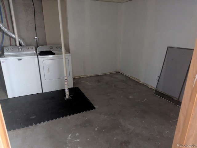 interior space with laundry area and washing machine and clothes dryer