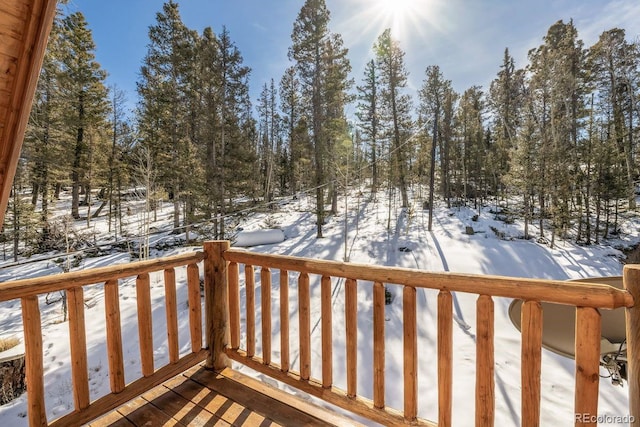 view of snow covered deck