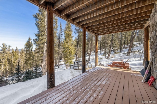 view of snow covered deck