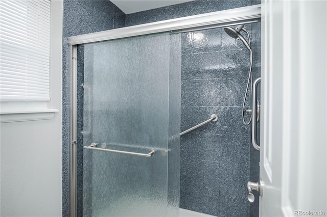 bathroom with an enclosed shower