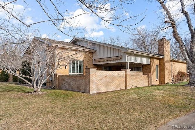 view of property exterior featuring a yard