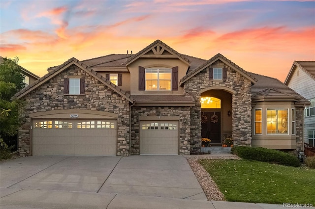 view of front of home with a garage