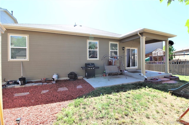 713 Indigo St, Brighton, CO 80603 - back of property featuring a patio