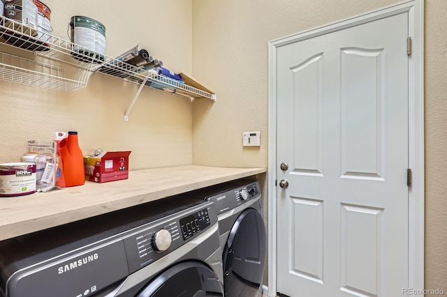 10117 Waco St, Commerce City, CO 80022 - washroom featuring washer and clothes dryer