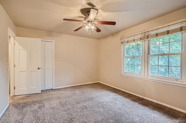 3540 E 5th Ave, Denver, CO 80206 - carpeted spare room featuring ceiling fan and baseboards